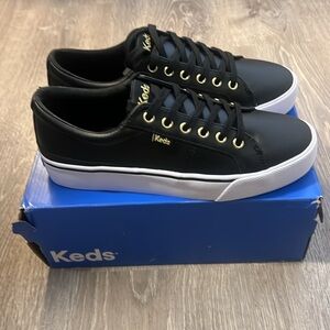 Brand new, never worn, Keds leather size 8.5 shoes.